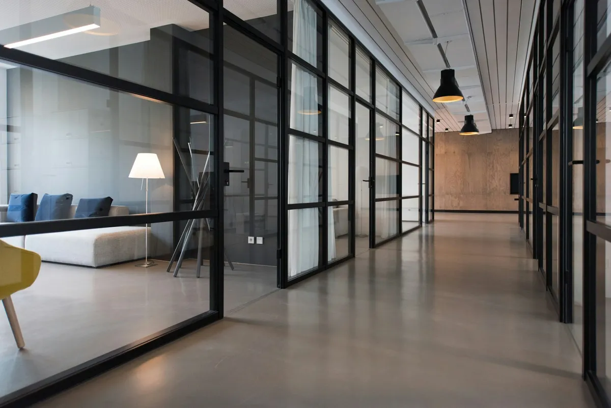 Organized office interior with shared workspaces; illustrative, not a company project or team
