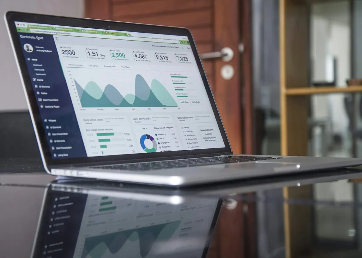 Computer displaying business information and charts; illustrative, not a company project or team